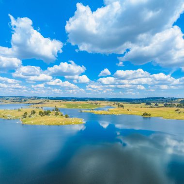 Scenic views over Lake Oberon which supplies drinking water and is ideal for canoes, kayaks and small fishing or sailing dinghies which are electric powered.  clipart