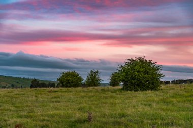 Sunset and clouds over the countryside on the outskirts of Blayney in the Central West of NSW, Australia. clipart