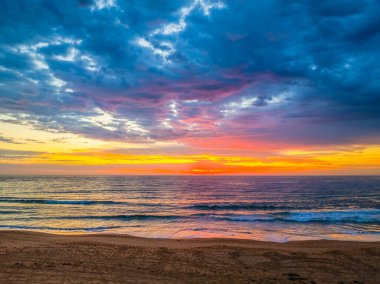 Sunrise Seascape at Bilgola Beach on the Northern Beaches of Sydney, NSW, Australia. clipart