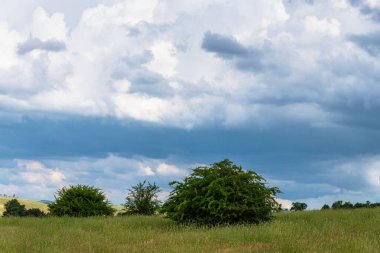 Stormy skies with impressive clouds over Blayney in the Central West of NSW, Australia. clipart