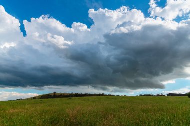 Stormy skies with impressive clouds over Blayney in the Central West of NSW, Australia. clipart