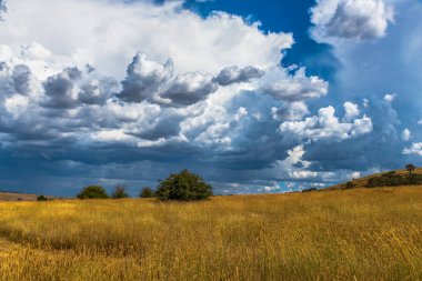 Storm clouds over the countryside around Blayney in the Central West of NSW, Australia. clipart