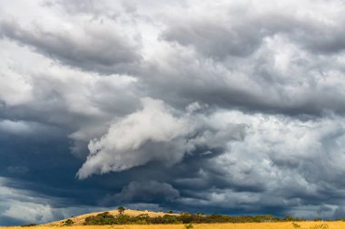 Afternoon storm clouds over Blayney in the Central West of NSW, Australia. clipart