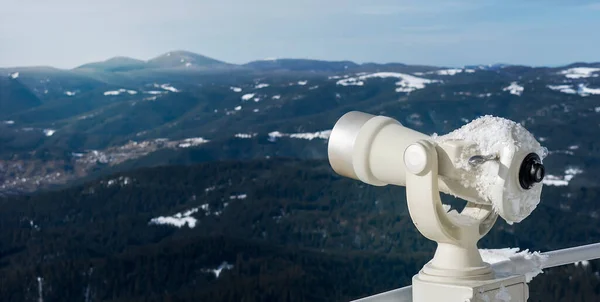 Stock image Touristic telescope and mountains range view. Overlooking of Rhodope Mountains from observation deck on Snezhanka TV tower in ski resort of Pamporovo, Bulgaria.