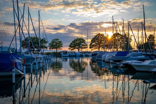 stock image colorful sunset at the harbour in Lochau at the lake Constance in Vorarlberg, Austria