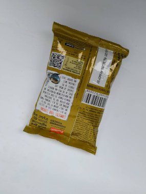 Bangalore, Karnataka, Hindistan-7 Mayıs 2020: Doğu Kişniş Tozu 'nun kapatılması beyaz arka planda izole edildi.