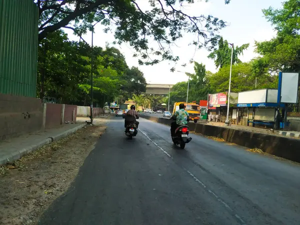 stock image Bangalore, Karnataka, India-April 20 2020: Closeup of beautiful asphalt road view of BMTC Bus Routes from Goraguntepalya to Hebbal.