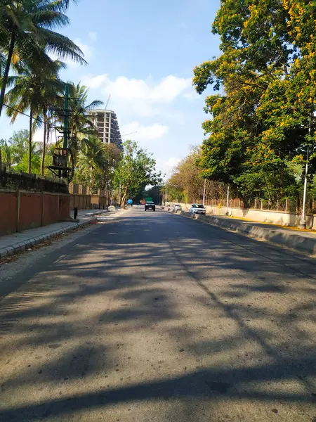 stock image Bangalore, Karnataka, India-April 20 2020: Closeup of beautiful asphalt road view of BMTC Bus Routes from Goraguntepalya to Hebbal.