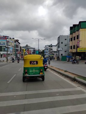 Bangalore, Karnataka, India-July 18 2024: Closeup Auto Rickshaw back view of Sandalwood Actor Darshan and Bollywood Actor Salman Khan together Movie Painting. clipart