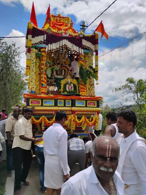 Channapatna, Karnataka, India-Oct 13, 2024: Closeup of beautiful decorated Chariot or Rathothsava celebration in village. clipart