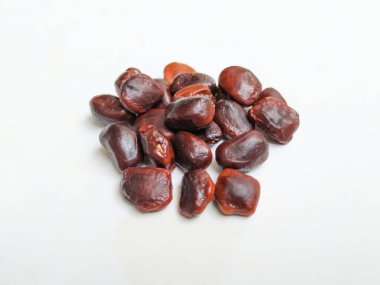 Tamarind Meyve Tohumları Yığını ve deseni beyaz arkaplanda izole edilmiş..
