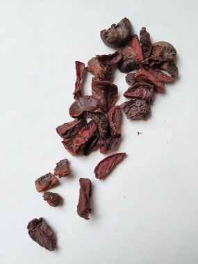 Adike ya da Areca 'ya yakın plan beyaz arkaplanda izole edilmiş desen ve dokuyu dilimler.