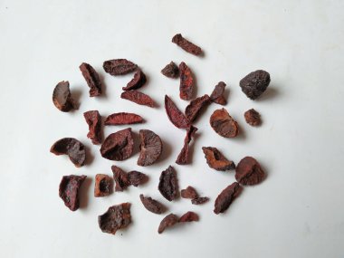 Adike ya da Areca 'ya yakın plan beyaz arkaplanda izole edilmiş desen ve dokuyu dilimler.