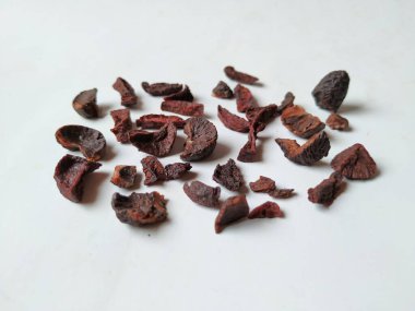 Adike ya da Areca 'ya yakın plan beyaz arkaplanda izole edilmiş desen ve dokuyu dilimler.