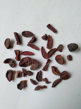 Adike ya da Areca 'ya yakın plan beyaz arkaplanda izole edilmiş desen ve dokuyu dilimler.