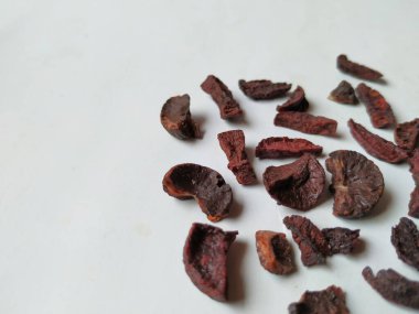 Adike ya da Areca 'ya yakın plan beyaz arkaplanda izole edilmiş desen ve dokuyu dilimler.