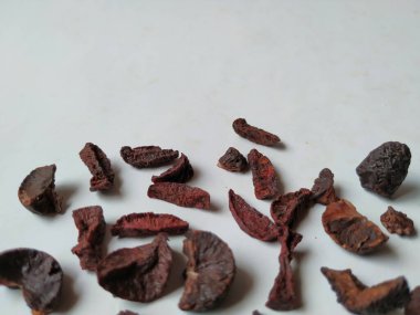 Adike ya da Areca 'ya yakın plan beyaz arkaplanda izole edilmiş desen ve dokuyu dilimler.