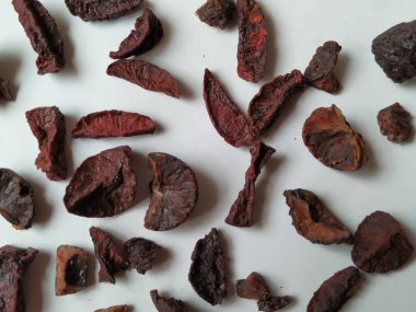 Adike ya da Areca 'ya yakın plan beyaz arkaplanda izole edilmiş desen ve dokuyu dilimler.