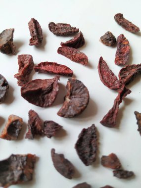 Adike ya da Areca 'ya yakın plan beyaz arkaplanda izole edilmiş desen ve dokuyu dilimler.