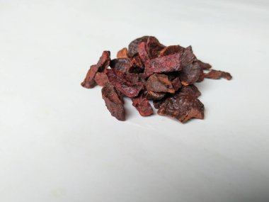 Adike ya da Areca 'ya yakın plan beyaz arkaplanda izole edilmiş desen ve dokuyu dilimler.