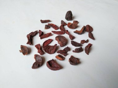 Adike ya da Areca 'ya yakın plan beyaz arkaplanda izole edilmiş desen ve dokuyu dilimler.