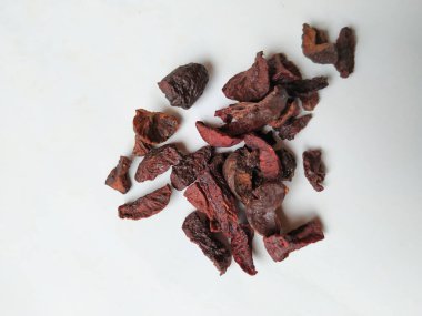 Adike ya da Areca 'ya yakın plan beyaz arkaplanda izole edilmiş desen ve dokuyu dilimler.