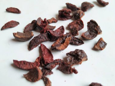 Adike ya da Areca 'ya yakın plan beyaz arkaplanda izole edilmiş desen ve dokuyu dilimler.