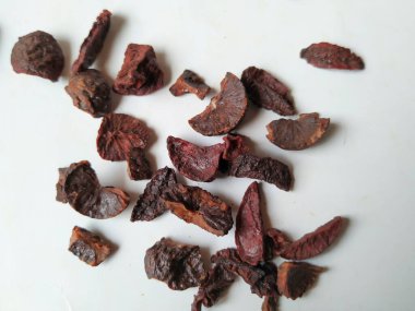 Adike ya da Areca 'ya yakın plan beyaz arkaplanda izole edilmiş desen ve dokuyu dilimler.