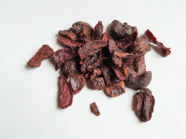 Adike ya da Areca 'ya yakın plan beyaz arkaplanda izole edilmiş desen ve dokuyu dilimler.