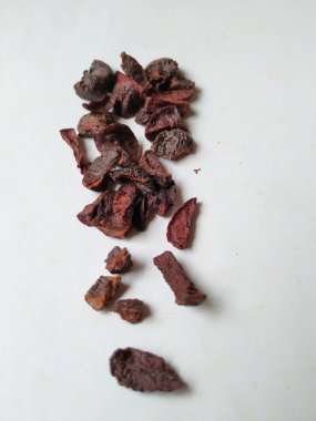 Adike ya da Areca 'ya yakın plan beyaz arkaplanda izole edilmiş desen ve dokuyu dilimler.