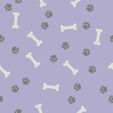 Hafif bir arka planda kemikler ve köpek ayak izleri.