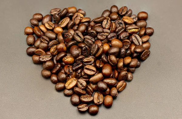 Espresso Roasted Coffee Beans Isolated Black Background Heart Close Dark — Stock Photo, Image