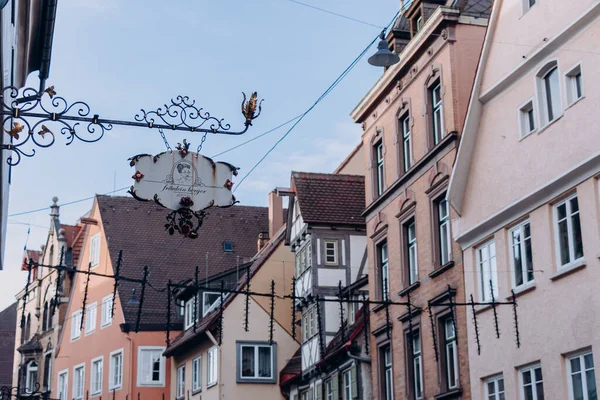 stock image Ulm, Germany 02.01.2023: Rustic Charm and Timeless Craftsmanship: A Wrought Iron Sign on a Fachwerk House in Ulm's Old Town