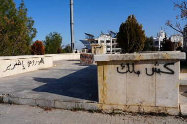 Victory of the Syrian revolution. Syrians destroy statues of Bashar al-Assad after he was ousted from the presidency. Syria, December 10, 2024. clipart