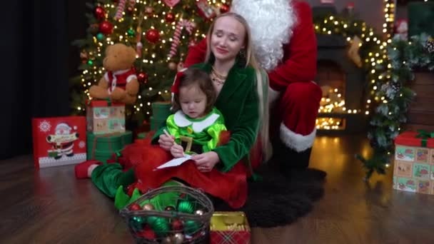 Happy Mother Daughter Sitting Santa Christmas Studio High Quality Fullhd — Stockvideo