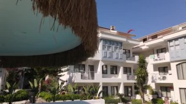 Panoramic view of luxury hotel in Turkey with pool bar, drone footage, summer time. High quality FullHD footage