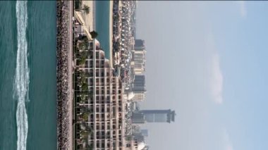 Panoramic view of Dubai marina, modern buildings, beautiful background, vertical video. High quality FullHD footage