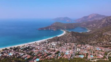Amazing beautiful panoramic view from drone of natural park of Oludeniz and Fethiye blue lagoon and tranquil aquamarine dead sea. High quality drone 4k footage