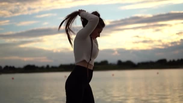 Brunette Woman Looking Camera Smiling Wave Her Braids Spinning Sunset — Stok video