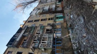 Mariupol, Ukraine - 03.21.2022: Destroyed city after the war with Russia, broken houses after shelling. High quality FullHD footage