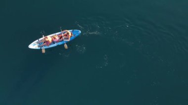 Top view of a family kayaking. High quality 4k footage