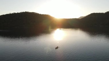 Girl, Man and Child Kayaking in the Sea. High quality 4k footage