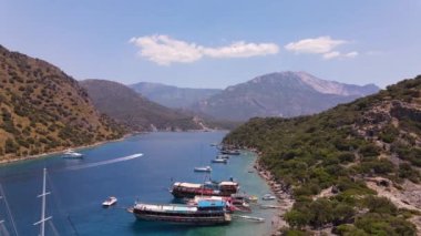 Aerial view on Turkish Fethiye mountains with boats and sailors. High quality FullHD footage