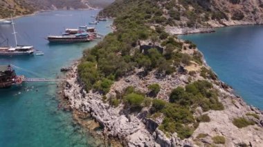 Aerial view of summer nature wiew and sea water. Flying above mountains. Drone shot. High quality FullHD footage