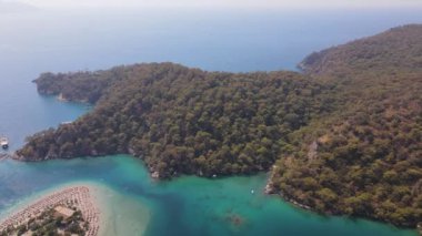 Large green mountains, near the Blue Lagoon, Fethiye, Oludeniz. Drone view. High quality 4k footage