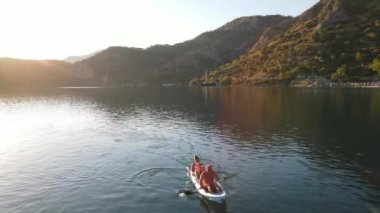 Aerial view on blue kayak with family in Oludeniz near Blue lagoon. High quality 4k footage