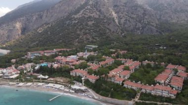 Houses in the middle of fethiye oludeniz overlooking the blue lagoon 4k