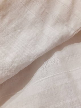 Beyaz desen, masumiyet, saflık. Arkaplan tasarımı, fotoğrafçılık. Tekstil, kumaş şablon