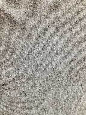 Gri örgü kumaş. Arkaplan tasarımı, fotoğrafçılık. Tekstil, kumaş şablonu, modern yeni