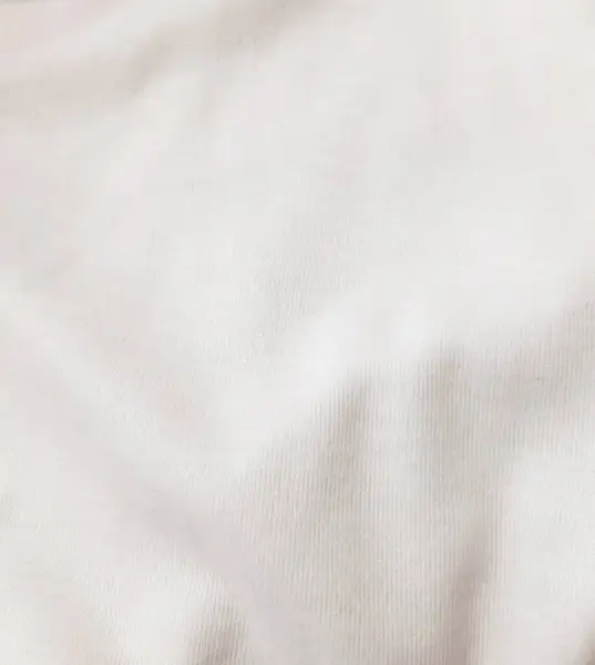 Beyaz, yumuşak kumaş. Arkaplan tasarımı, fotoğrafçılık. Tekstil, kumaş şablonu, modern 
